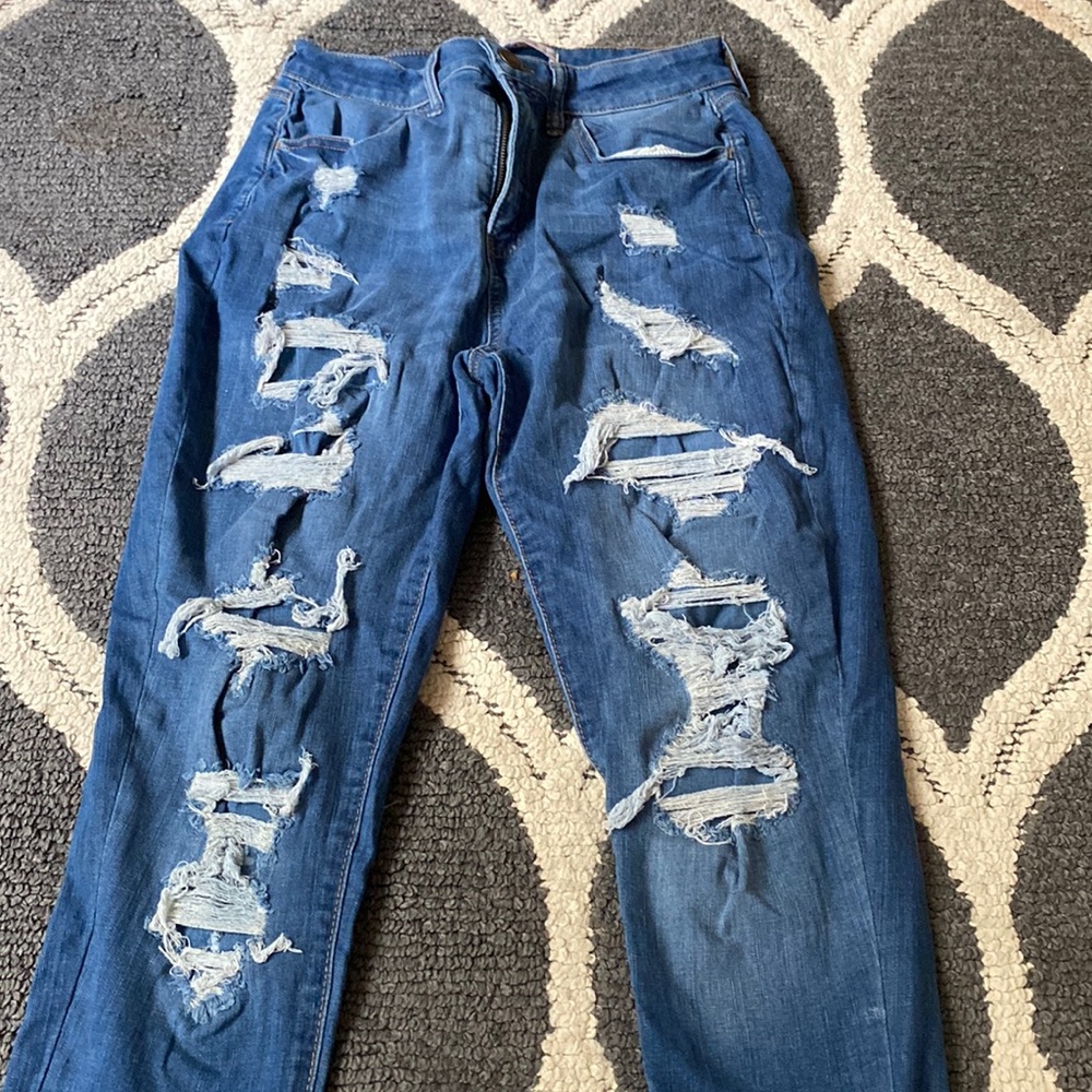 Blue high rise ripped Jean only been worn once or twice. Good condition.